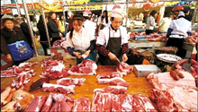 State Council planning more measures to restore nation's hog production 