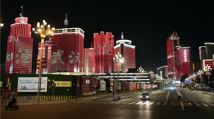 Yunnan lights up landmark buildings for Wuhan