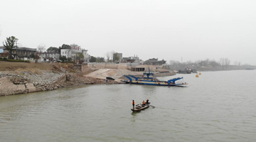 China strives to aid fishermen after river ban