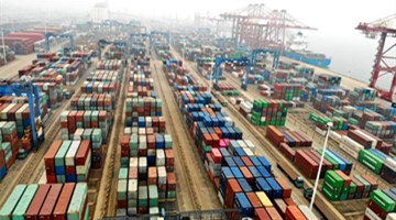 China's foreign trade on more solid ground with exports up nearly 15 pct in Nov.