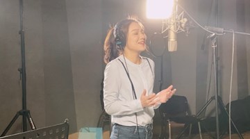Yunnan-born musician sings friendship song in German