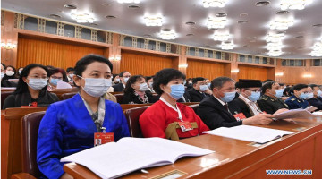 session of 13th CPPCC National Committee holds 2nd plenary meeting