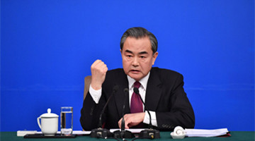 Wang Yi refutes attacks by U.S., Japan on China at EAS