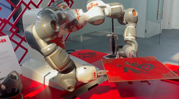  Robot wows visitors with calligraphy at World Robot Conference 2021
