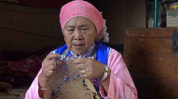 73-year-old inherits Yi embroidery in Kaiyuan
