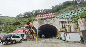 Through water and toxic gases, China digs through new challenging tunnel