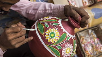 Indian potters make earthen lamps for upcoming Diwali in New Delhi 
