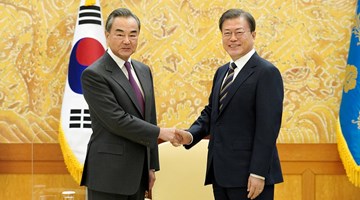 Moon Jae-in, Wang Yi meet, vow to boost bilateral cooperation