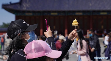 China sees 230 mln domestic tourist trips during May Day holiday