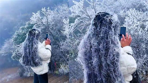 Rime on girl’s hair admired in Guangdong